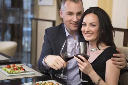 couple make a wine toast